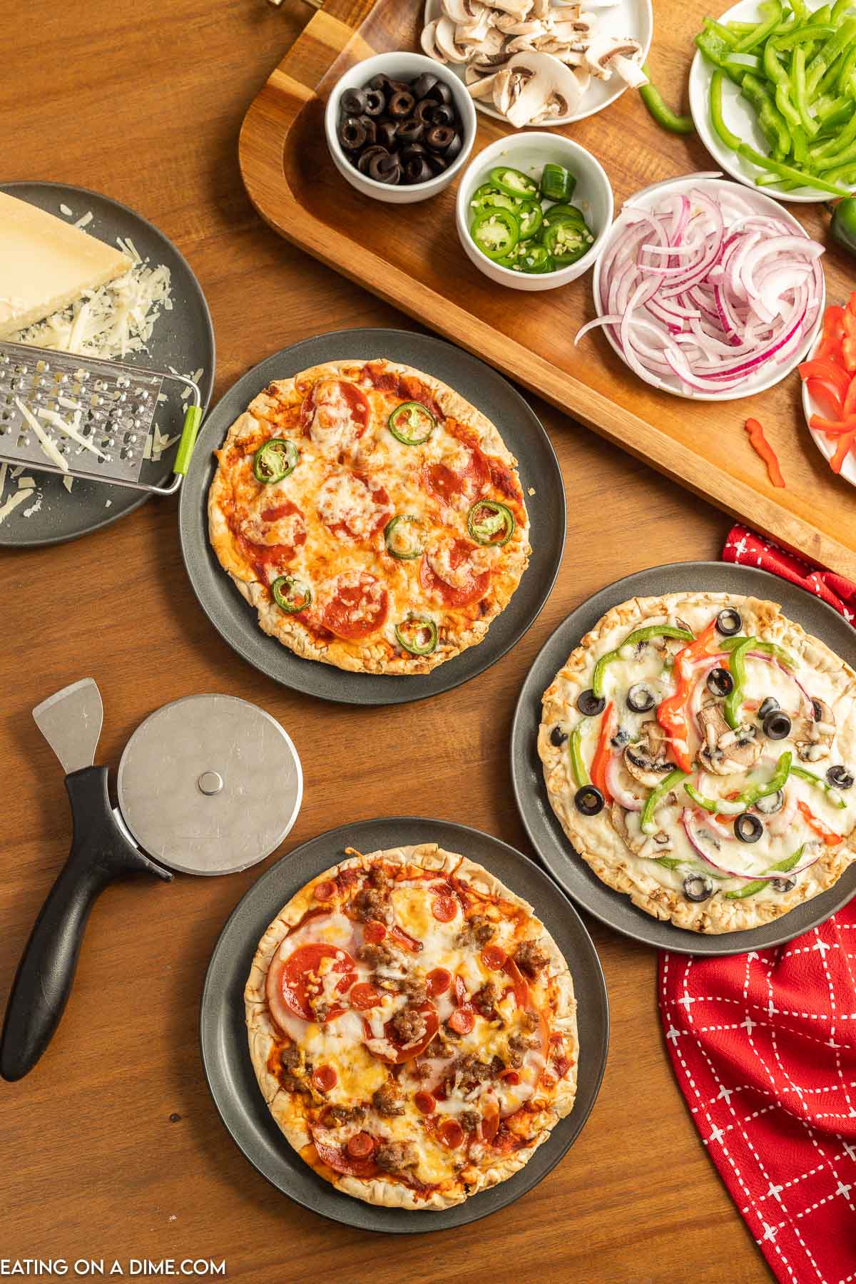 https://www.eatingonadime.com/wp-content/uploads/2023/02/how-to-make-a-pizza-bar-9.jpg
