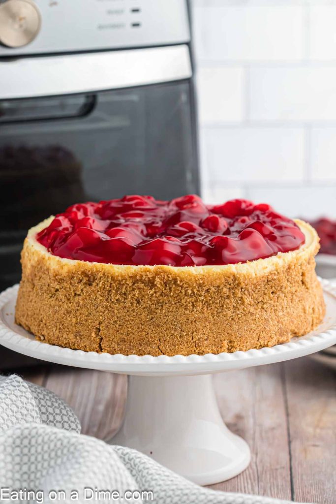 Cherry Topped Cheesecake on a platter