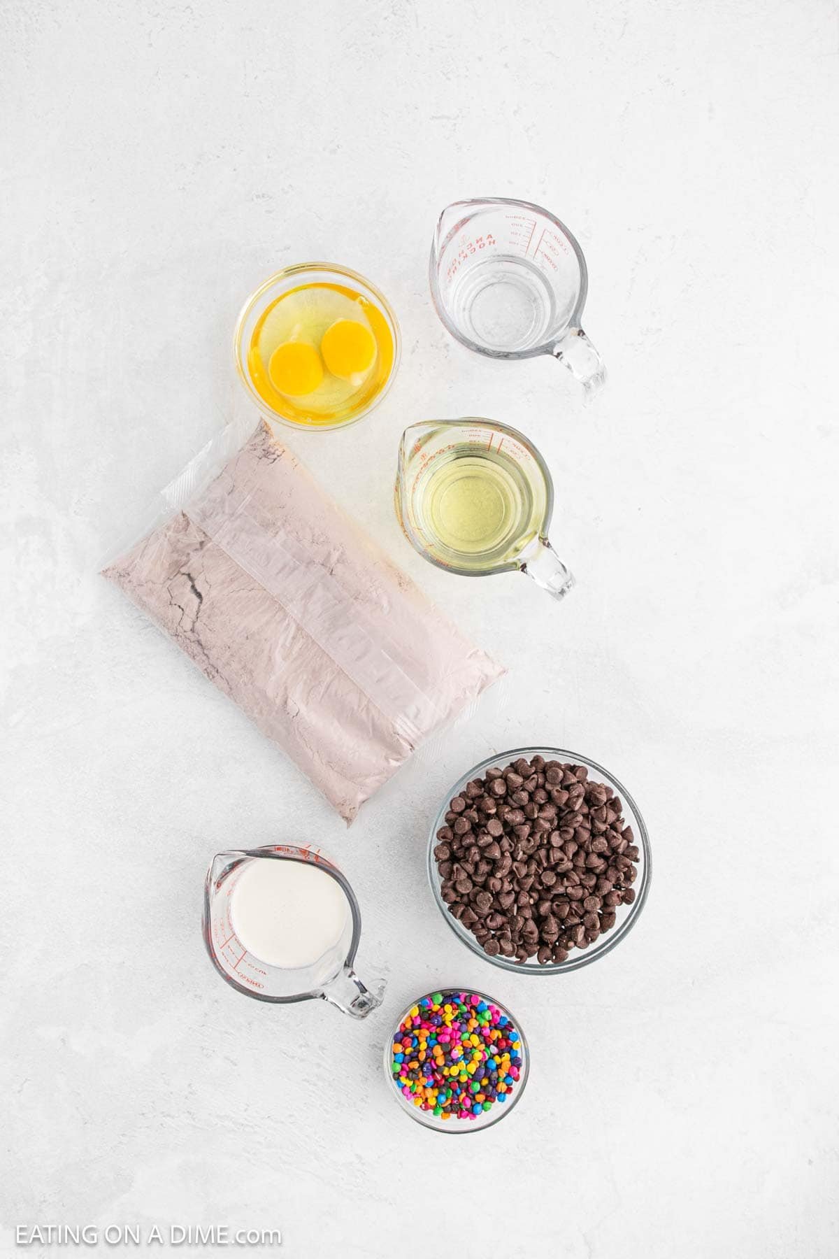 Brownie Mix, eggs, oil water, heavy cream, chocolate chips and rainbow colored chocolate chips