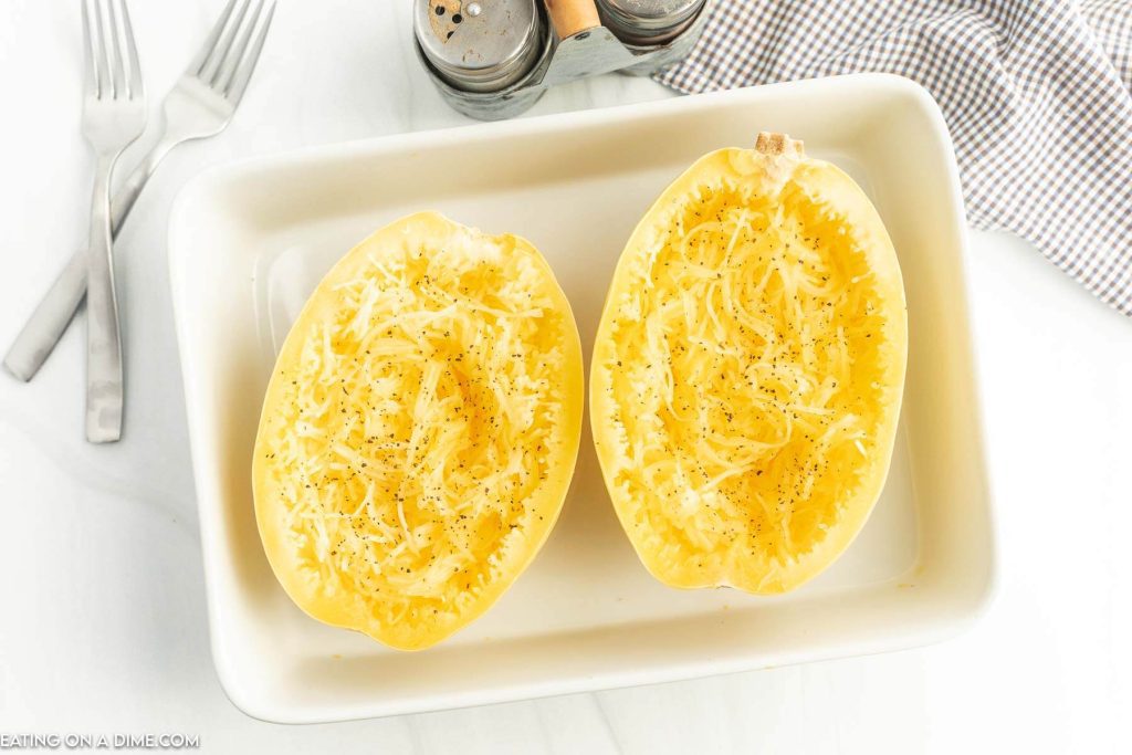 Cooked spaghetti squash in a baking dish