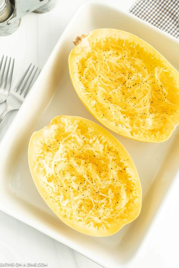 Cooked spaghetti squash in a baking dish