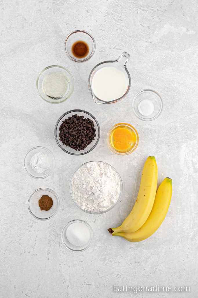 Ingredients needed - bananas, flour, baking powder, salt, cinnamon, sugar, milk, egg, vegetable oil, vanilla extract, chocolate chips