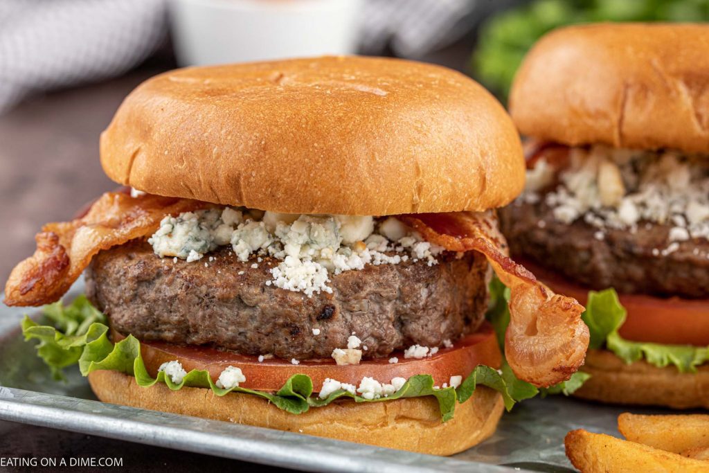 Bacon blue cheese burger on a plate. 