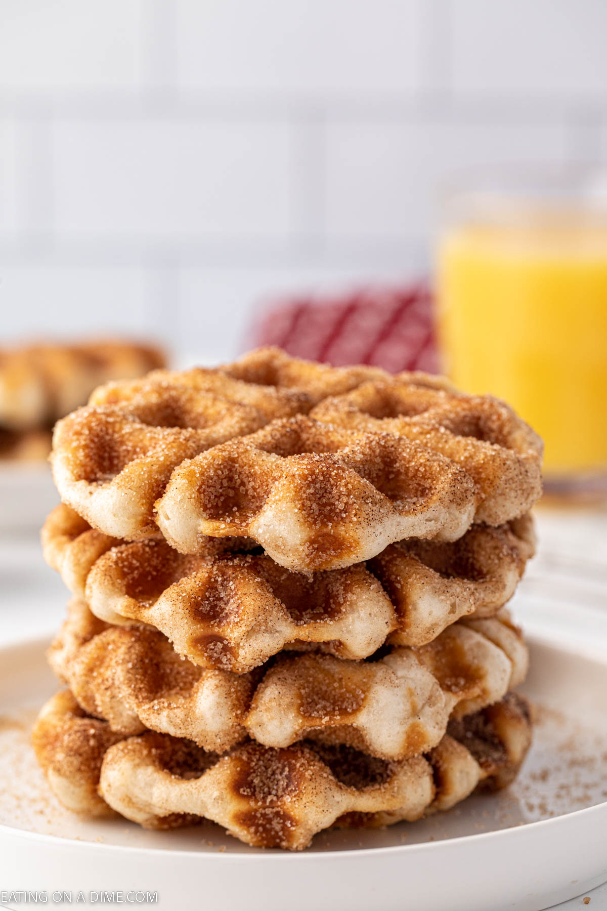 Cinnamon and Sugar biscuit waffle stacked on a plate