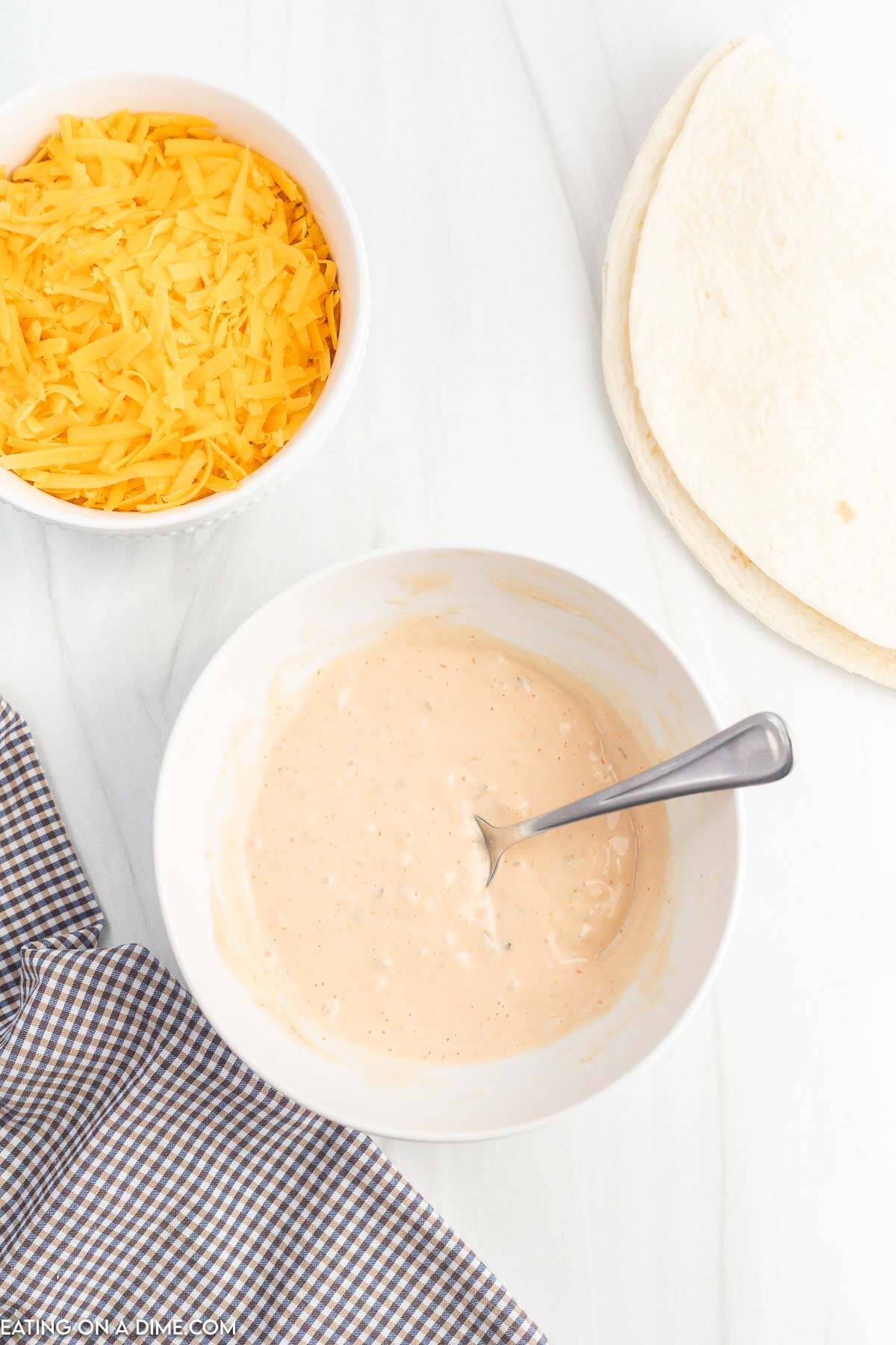 combining the sauce ingredients in a bowl