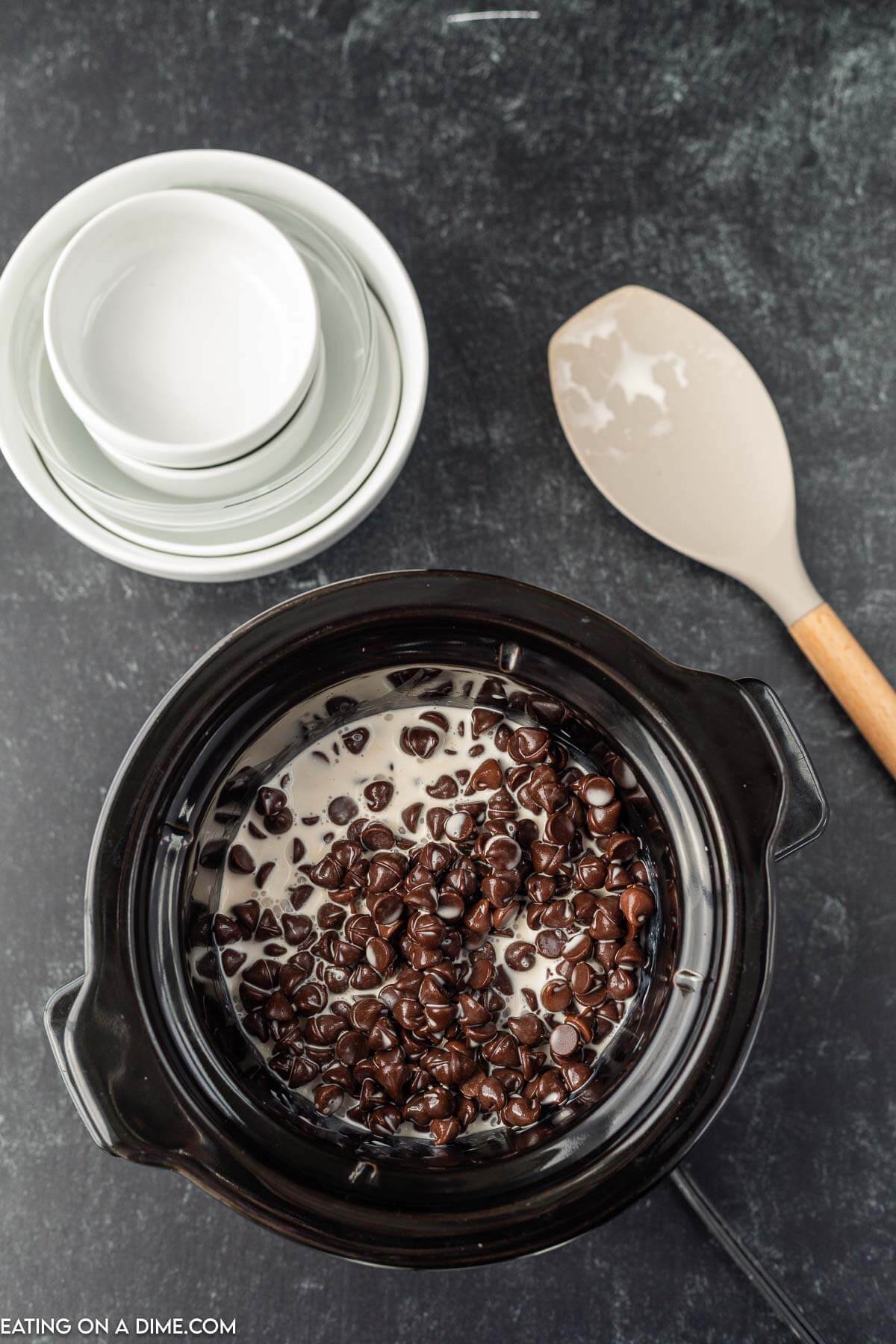 Adding the ingredients to the slow cooker