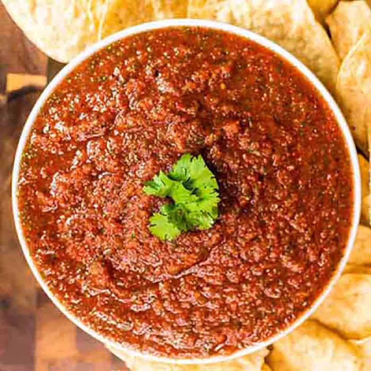 Homemade Salsa Recipe is so easy that you will not believe it.  Make this in minutes and enjoy the best salsa and chips at home. Yum!