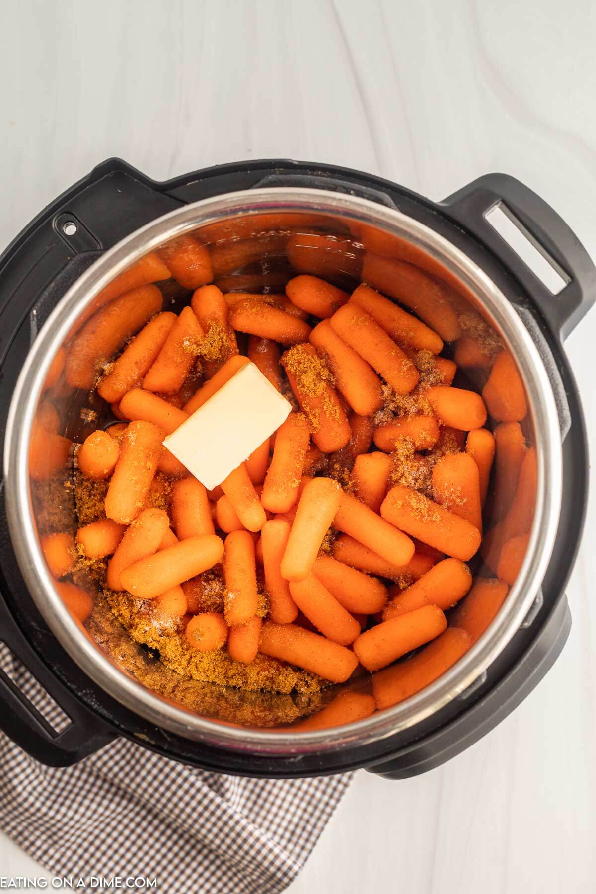 Placing the ingredients in the instant pot to cook 