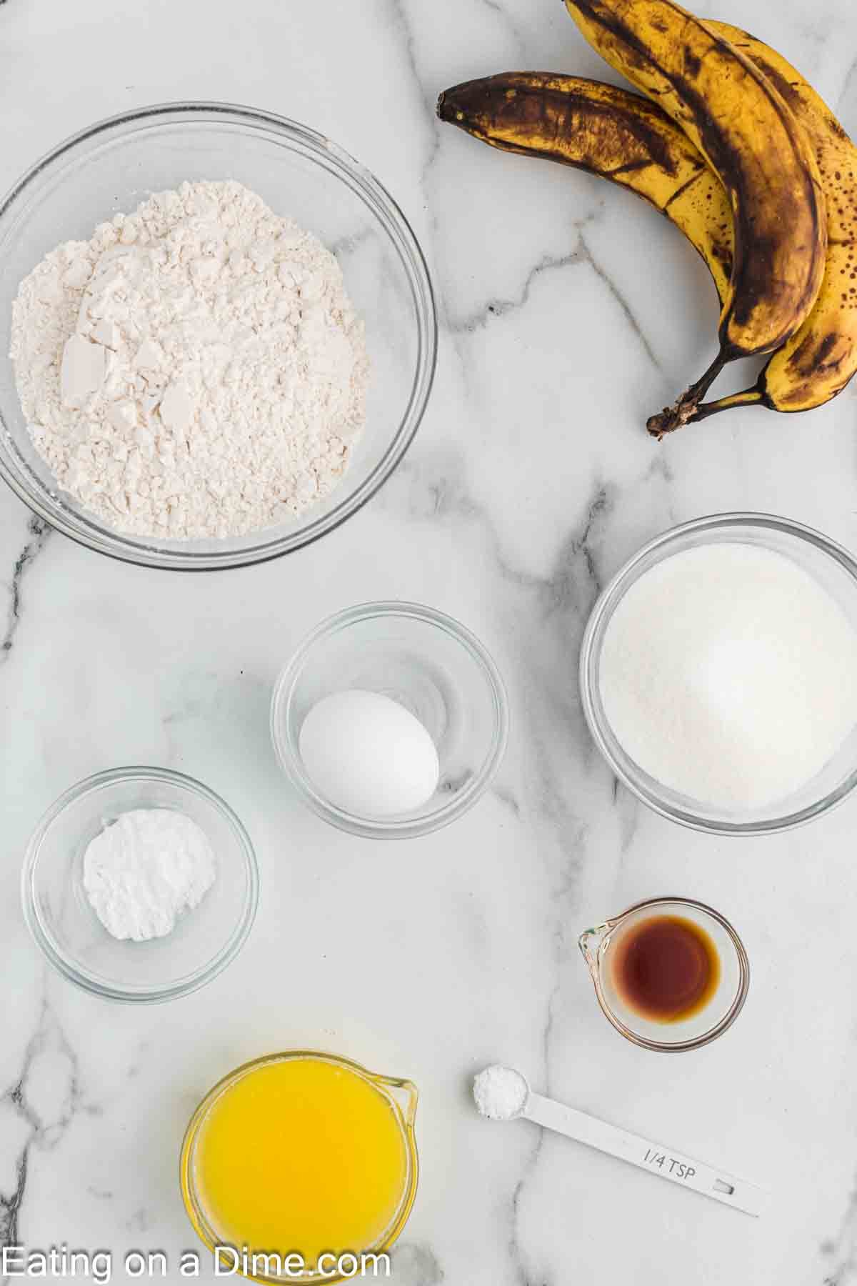 Ingredients needed - bananas, butter, egg, sugar, vanilla extract, baking soda, salt, flour