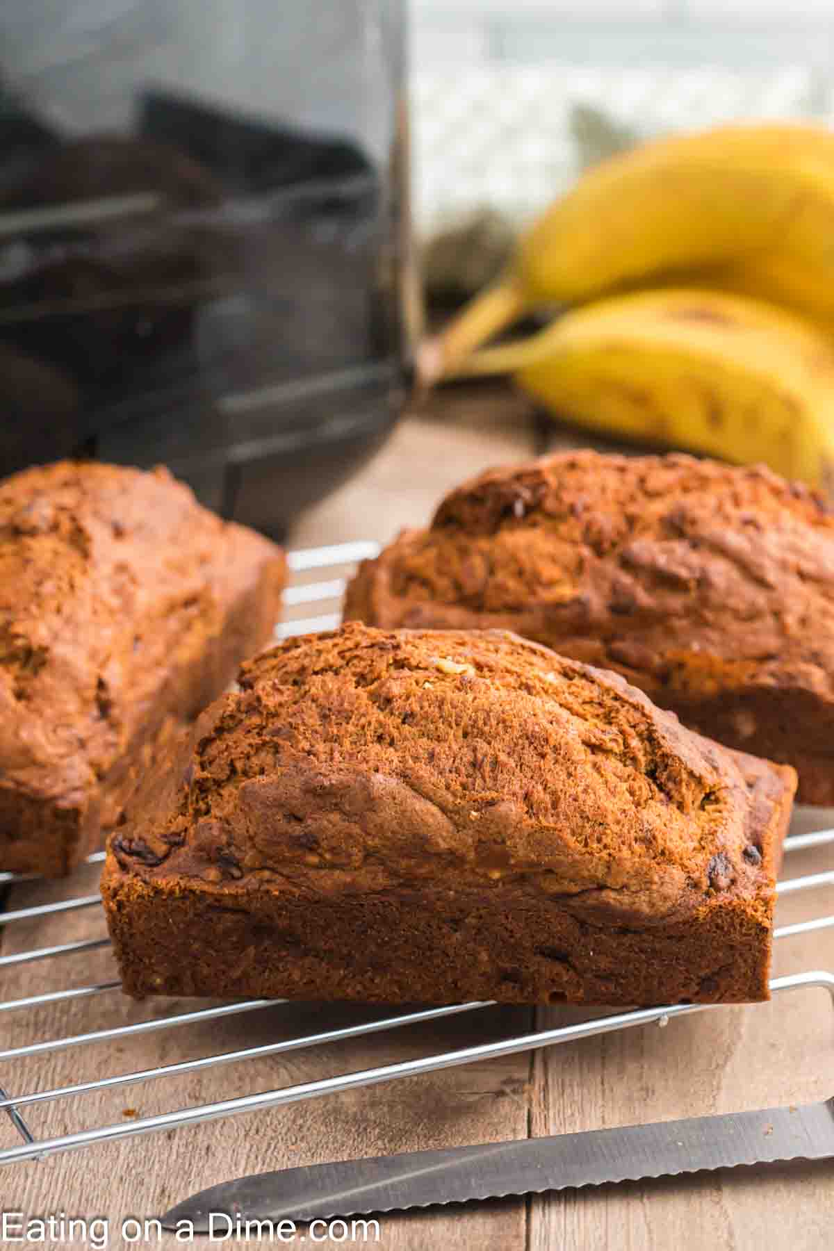 Banana Bread loafs on a wire rack