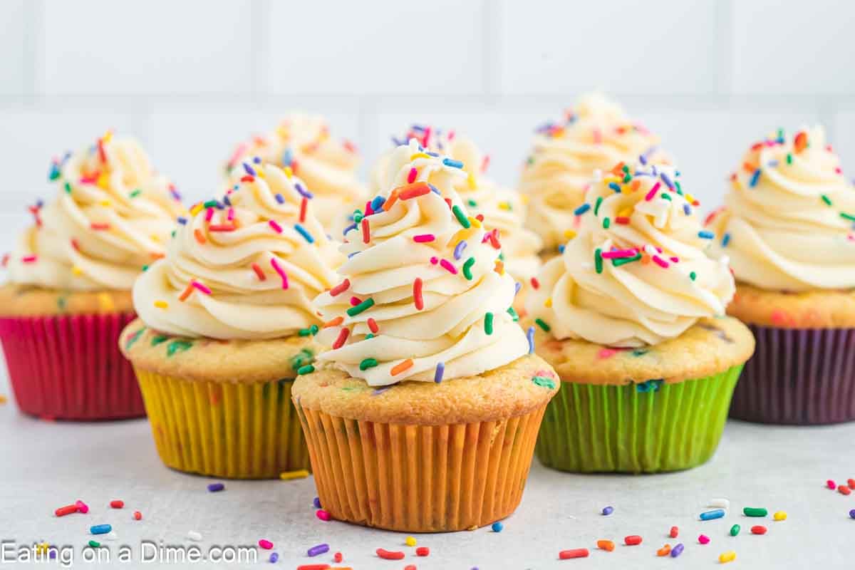 Confetti Cupcakes topped with homemade frosting and sprinkles