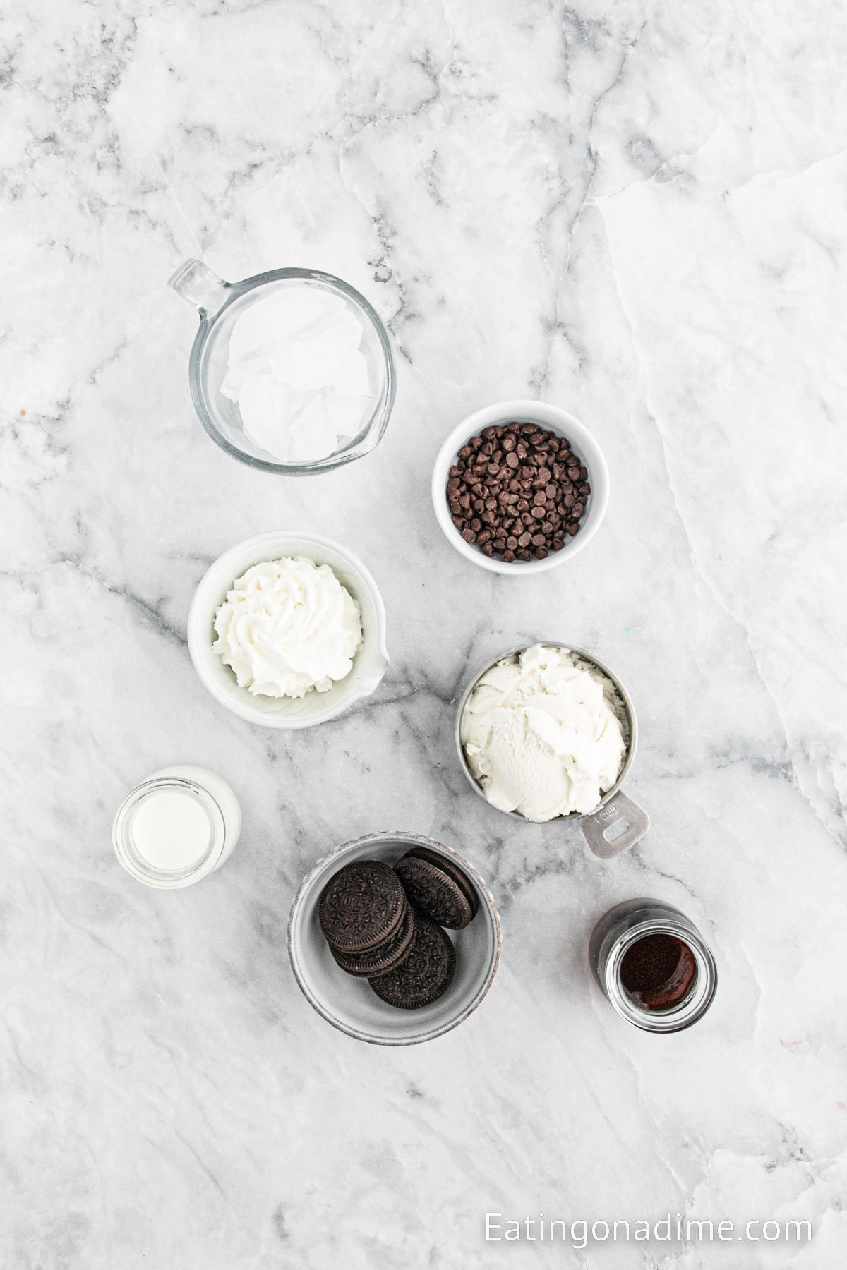 Ingredients for Starbucks Cookies and Cream Frappuccino. Vanilla Bean Ice Cream, espresso, half and half, mini chocolate chips, Oreo cookies, ice, whipped cream