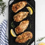 Grilled chicken on the grill.