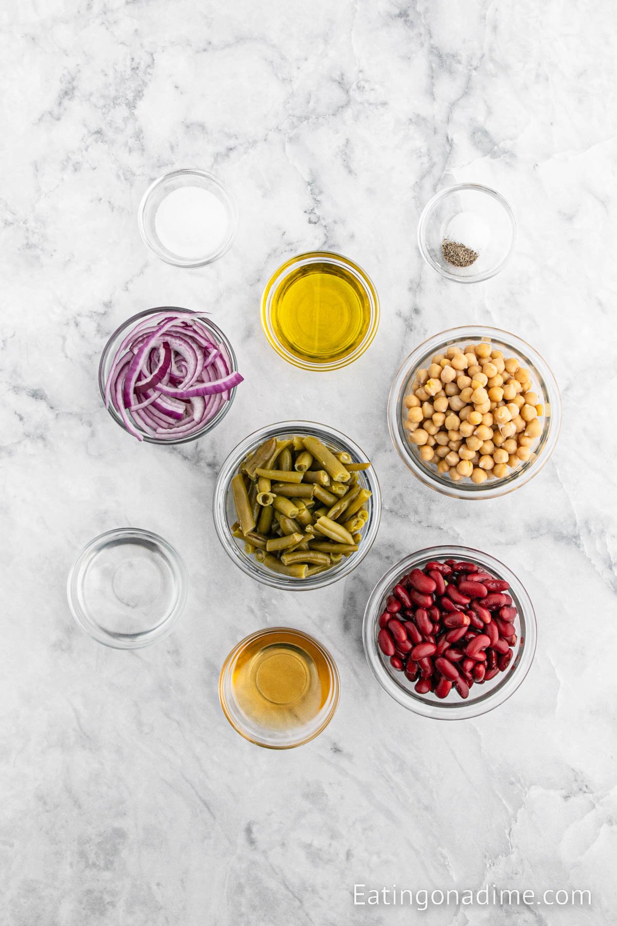 Ingredients for 3 bean salad - red kidney beans, green beans, garbanzo beans, red onion, white wine vinegar, apple cider vinegar, sugar, olive oil, salt, pepper