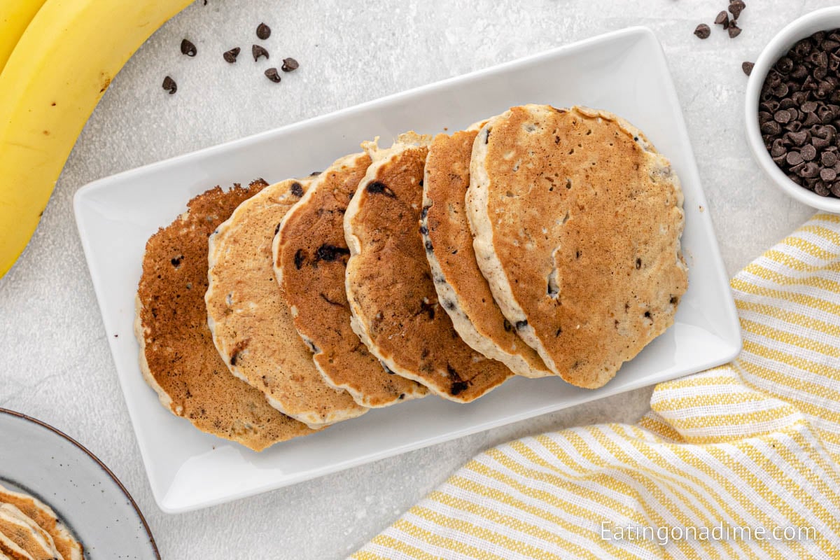 Stacked Banana Chocolate Chip Pancakes on a plate