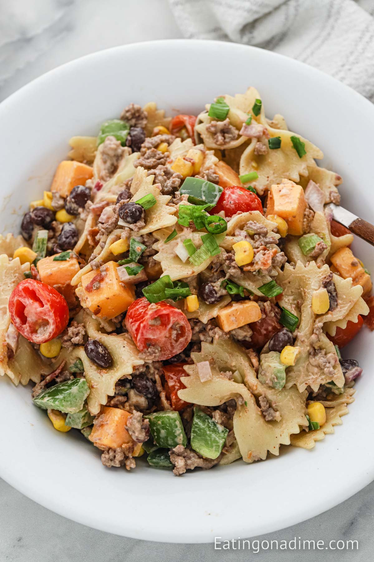 Cowboy Pasta Salad in a white bowl