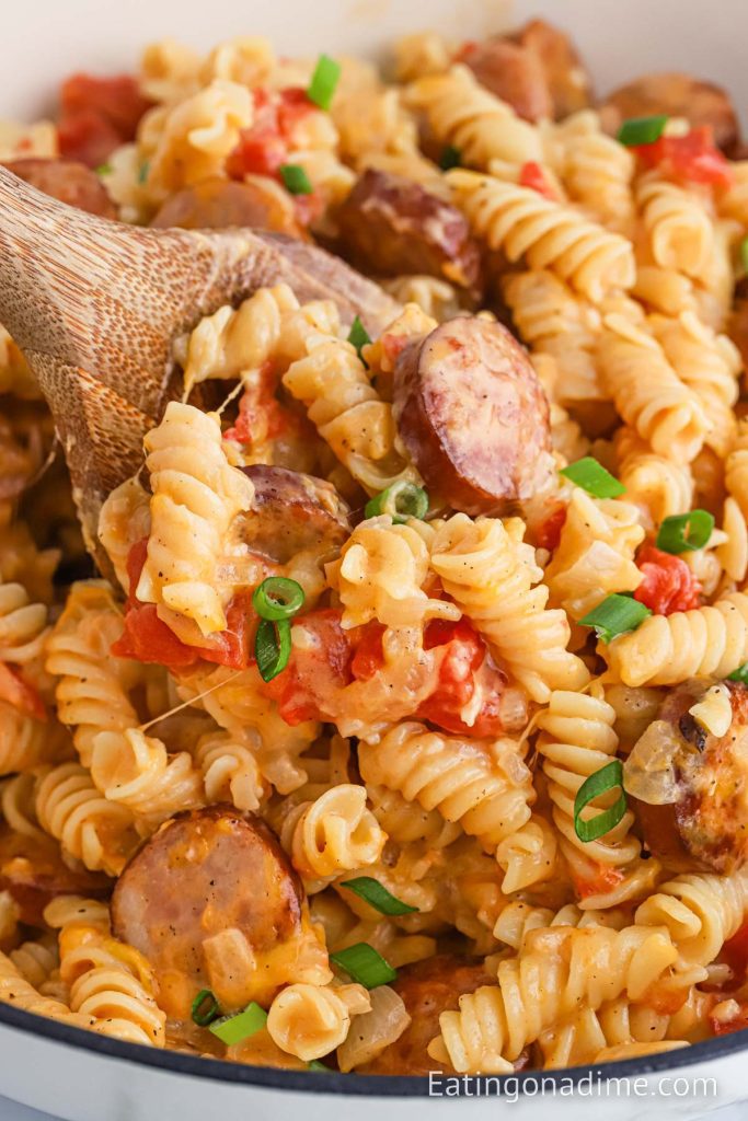 Kielbasa and Pasta with a serving on a wooden spoon