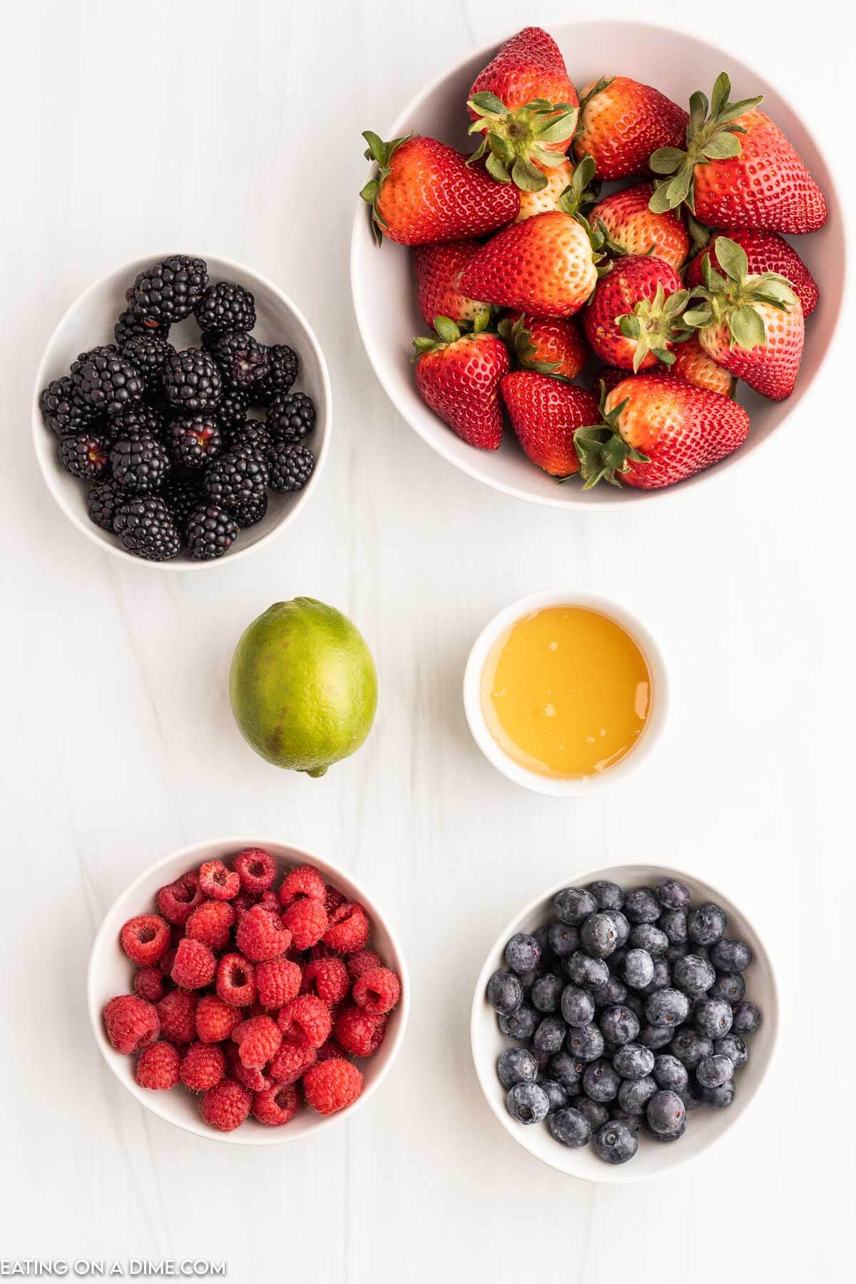 Ingredients needed - strawberries, blueberries, blackberries, raspberries, lime, honey