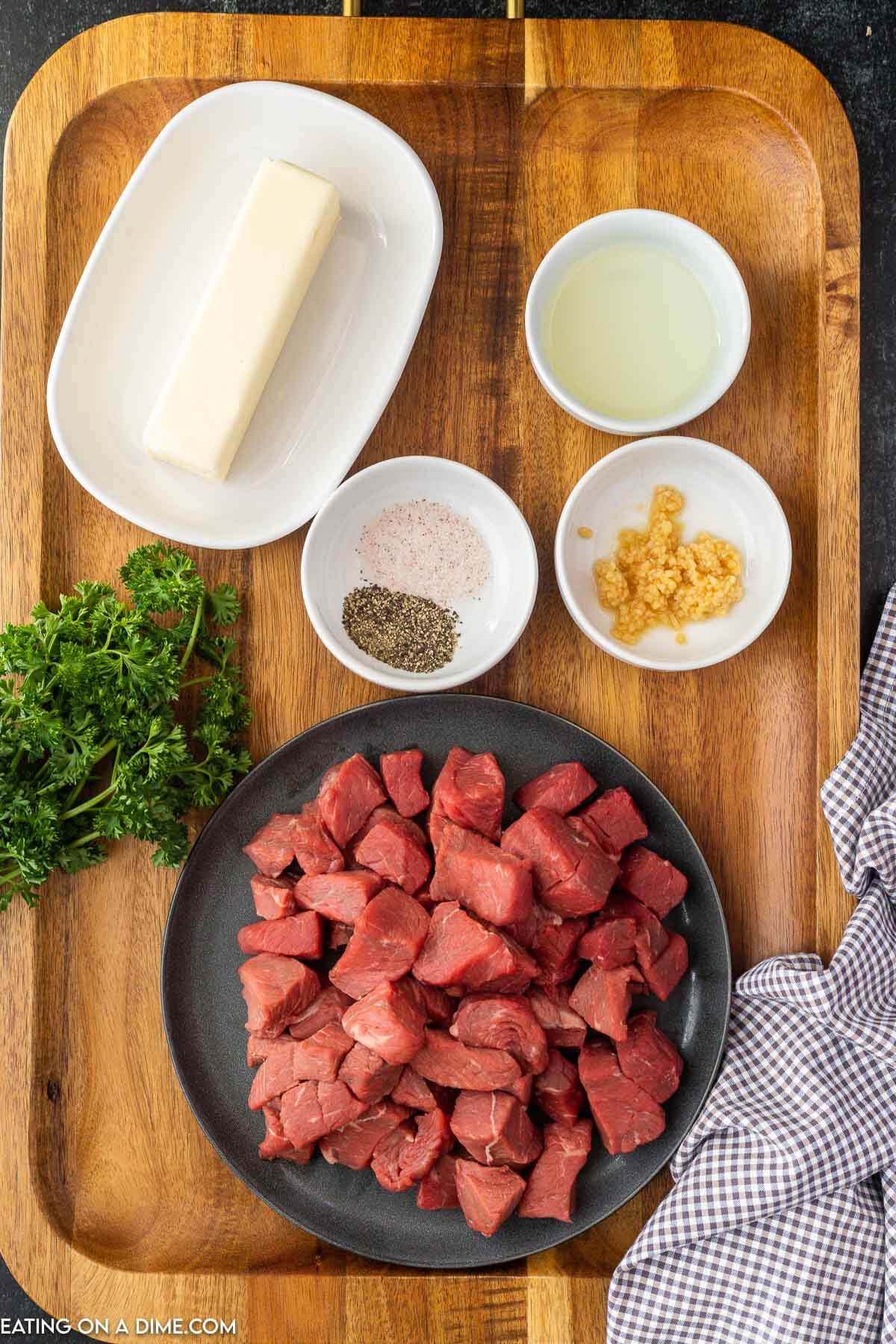 Ingredients for Garlic butter steak bites. Olive Oil, sirloin steak, salt and pepper, butter, minced garlic, fresh parsley