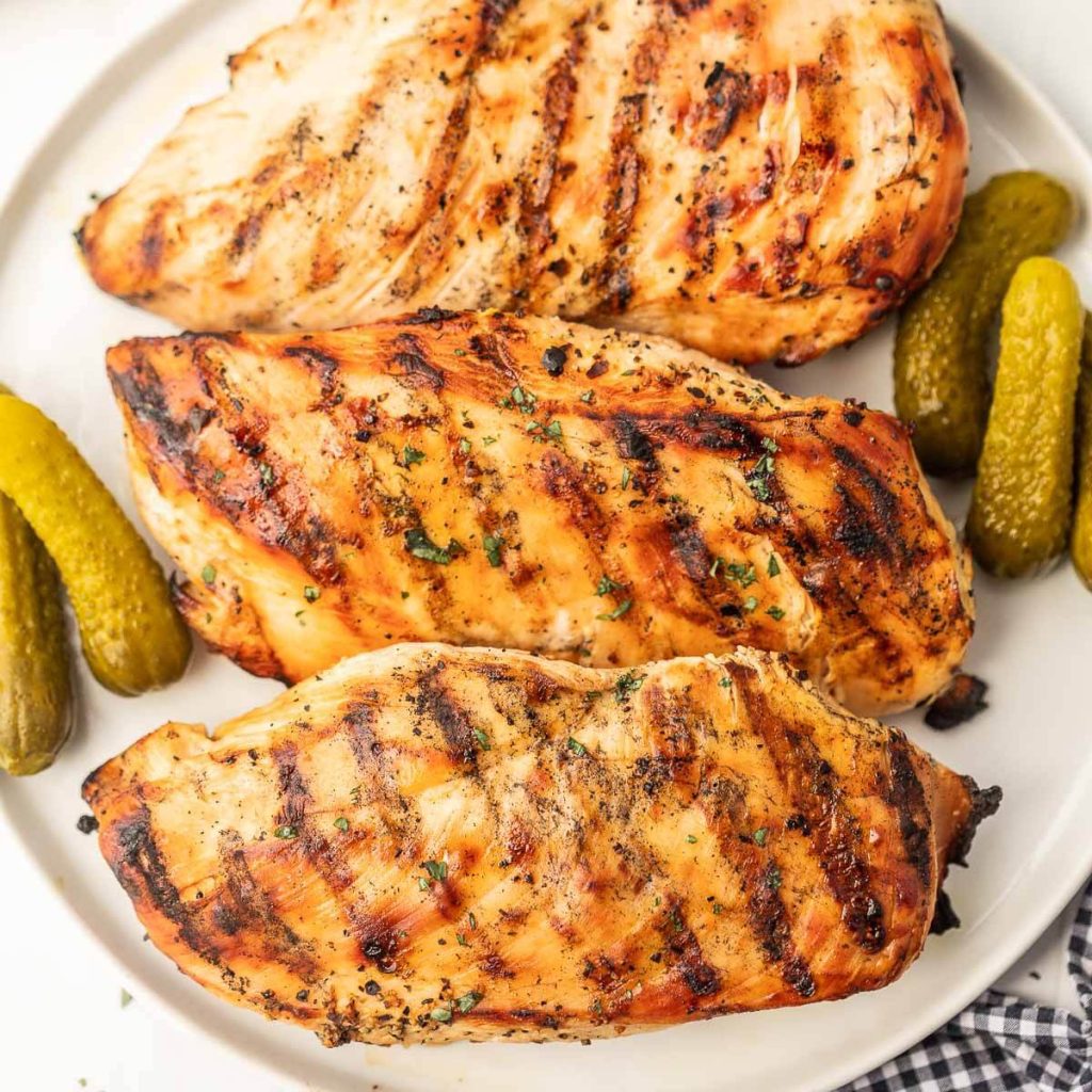 Chicken with pickle juice marinade on a plate. 