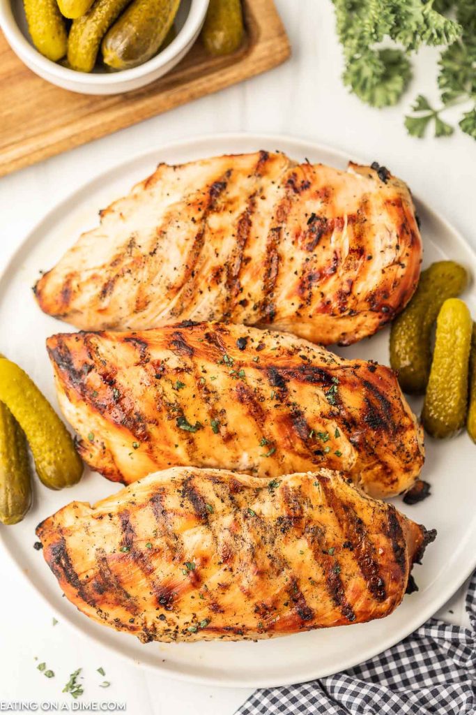Chicken with pickle juice marinade on a plate. 
