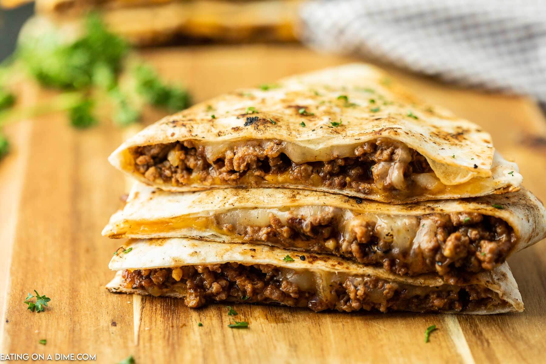 Sloppy Joe Quesadillas cut into triangles. 