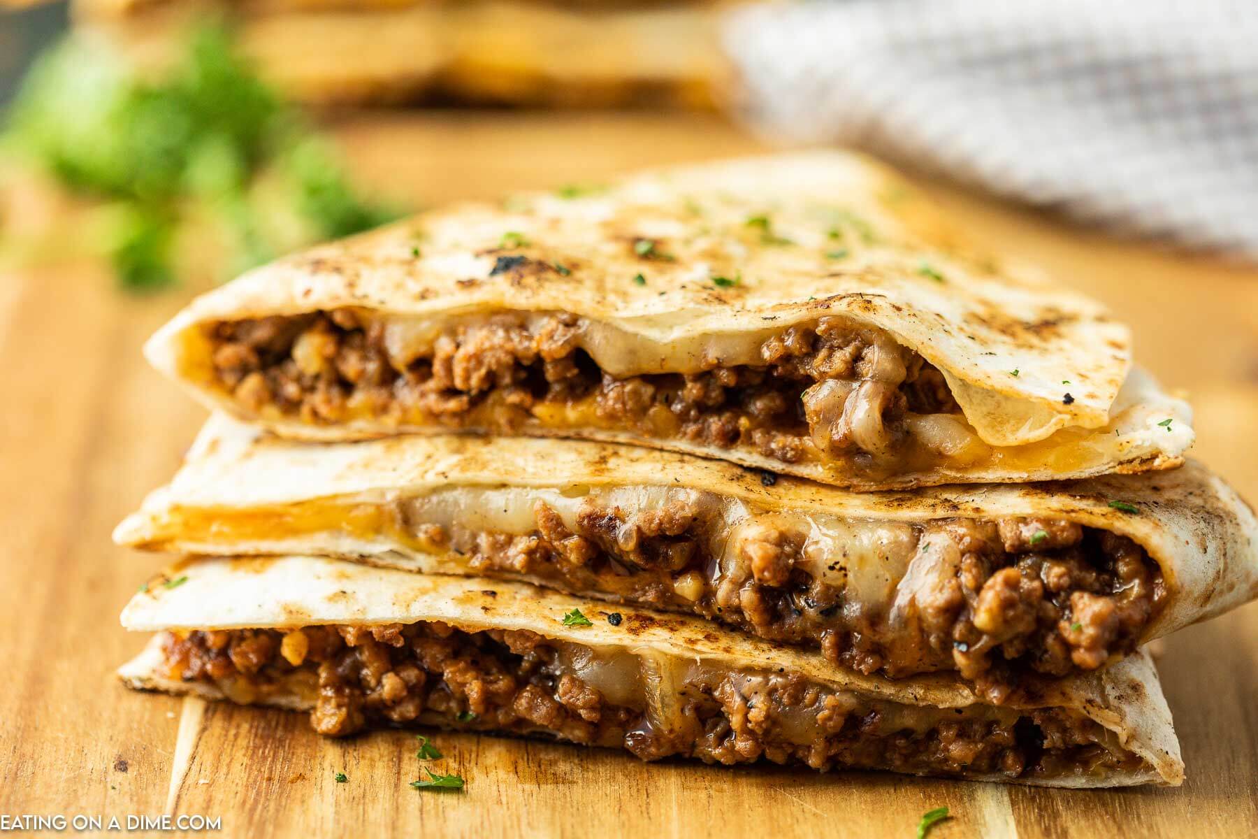 Sloppy Joe Quesadillas cut into triangles. 