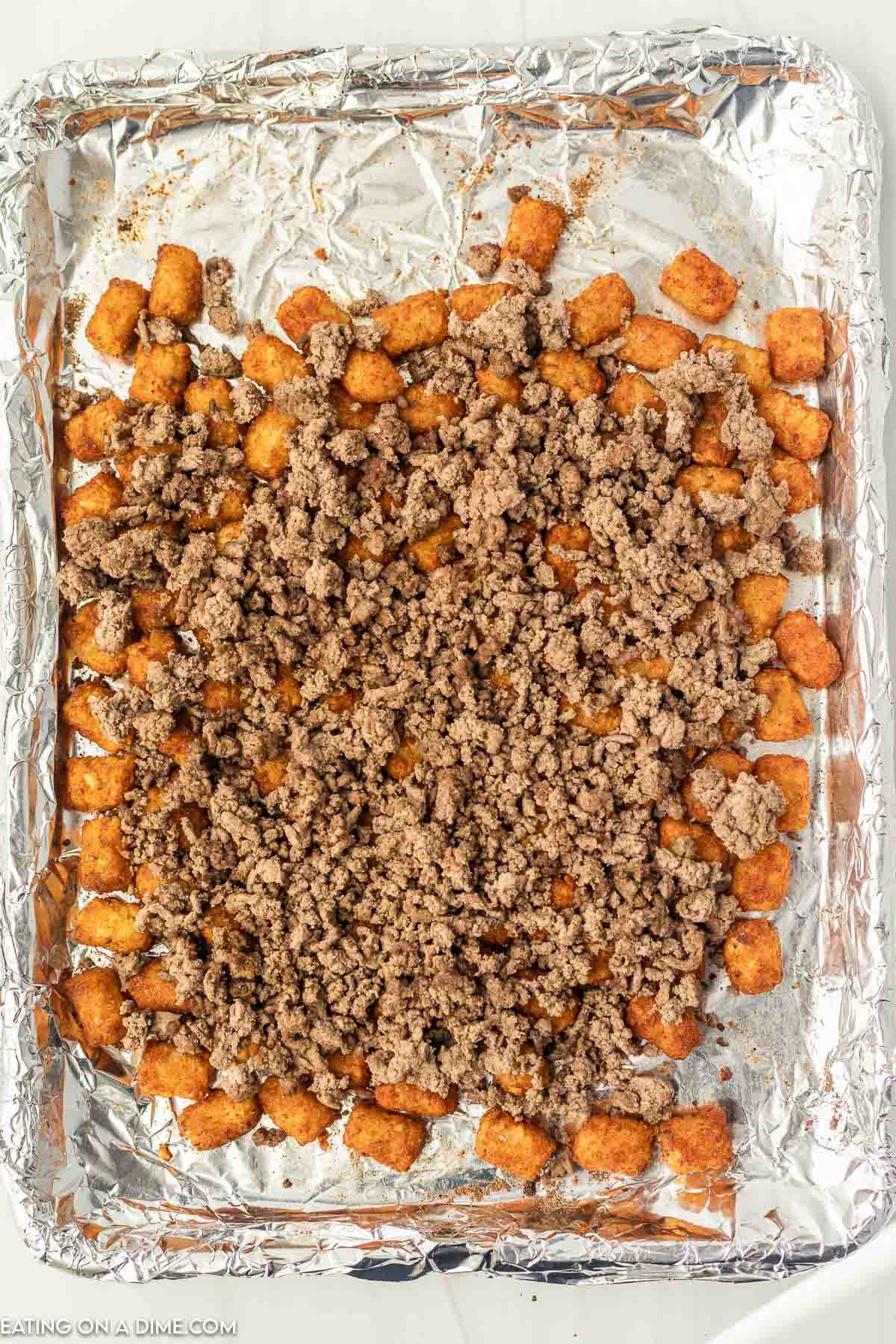top the tator tots with ground beef