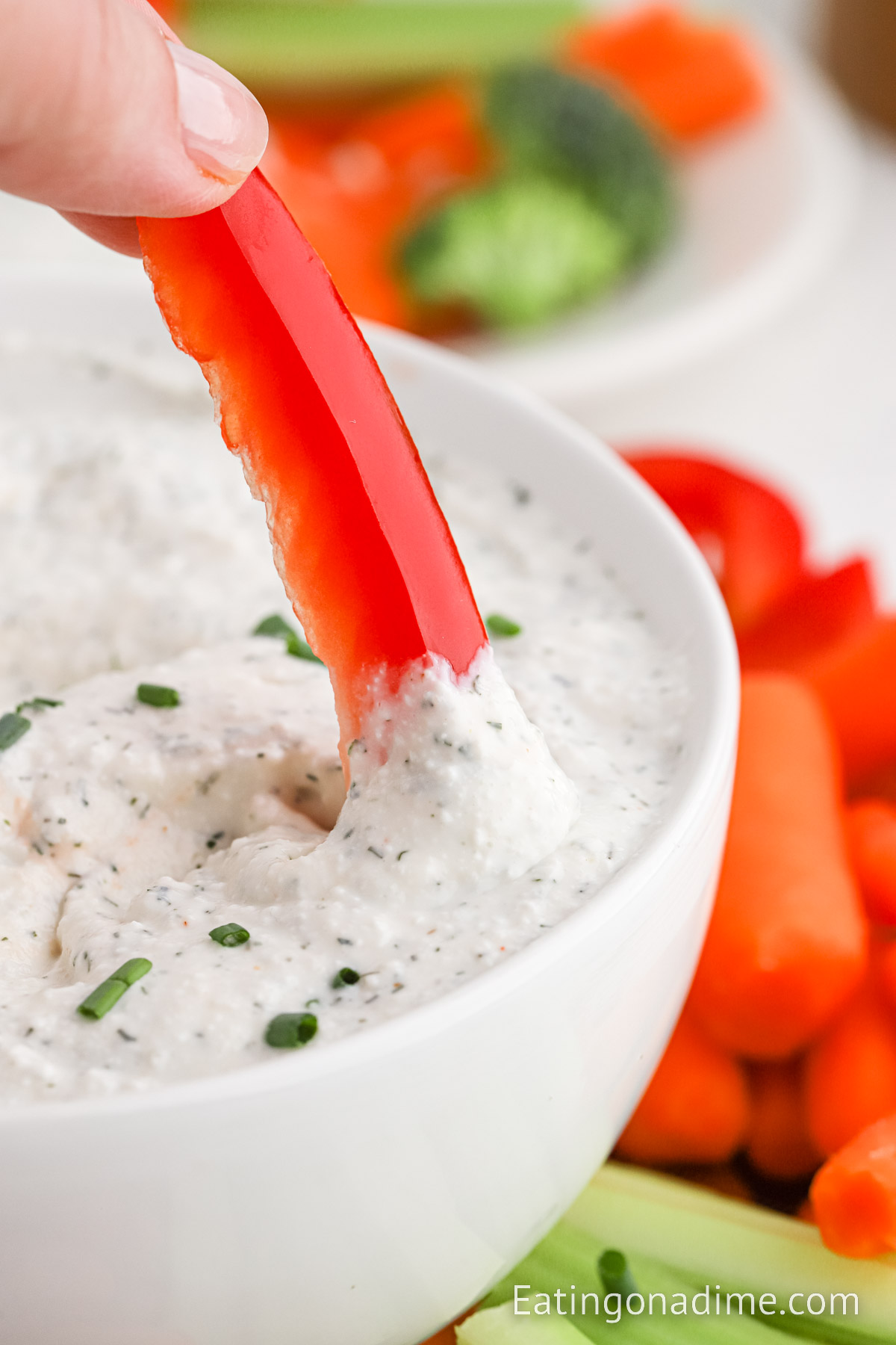 Close up image of cottage cheese dip with bell peppers