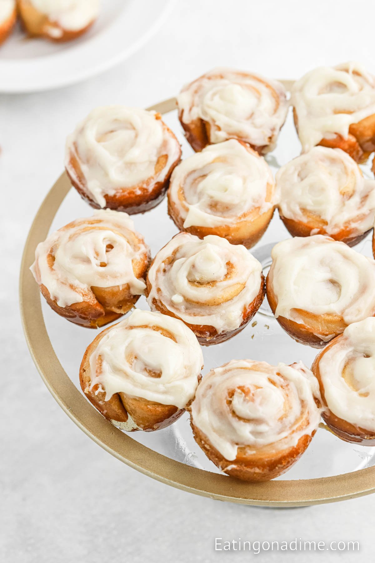 close up image of mini cinnamon rolls on a platter