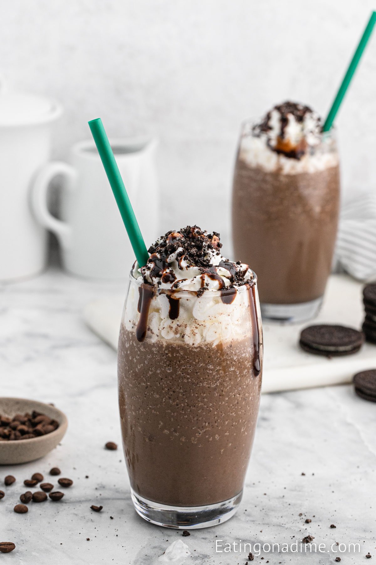 Mocha Cookie Crumble Frappuccino topped with whipped cream and chocolate syrup