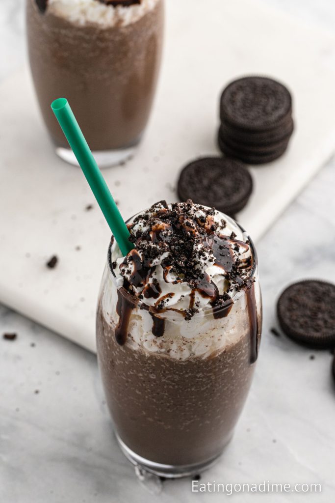 Mocha Cookie Crumble Frappuccino topped with whipped cream and chocolate syrup