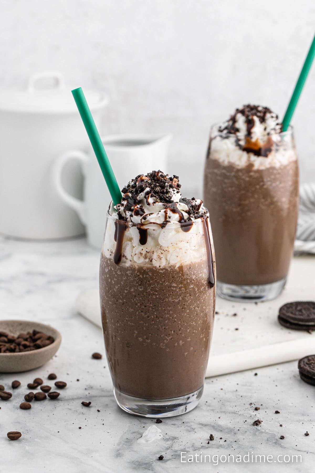 Mocha Cookie Crumble Frappuccino topped with whipped cream and chocolate syrup