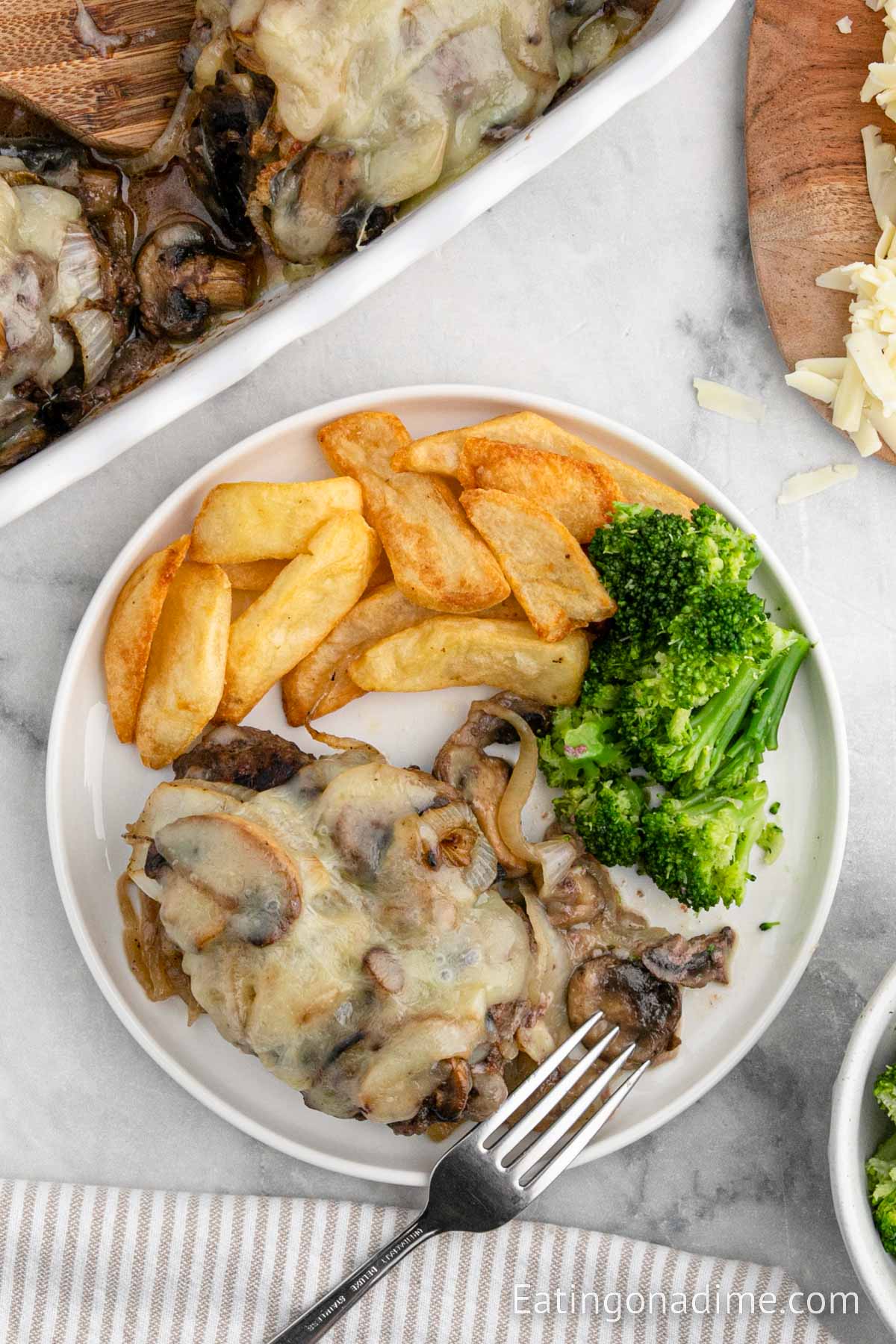 Roadkill on a plate with french fries and broccoli