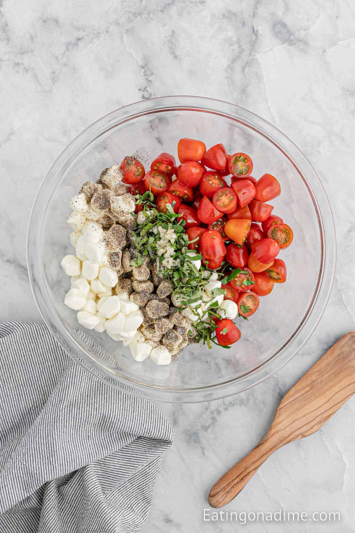 Combining the ingredients in a bowl with the seasoning