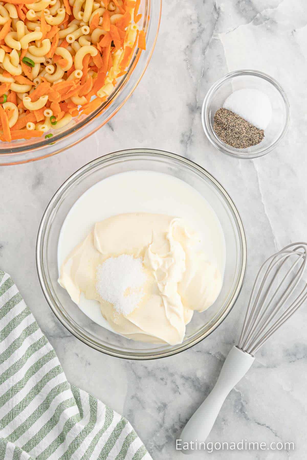 Milk, sugar, and mayonnaise in a bowl