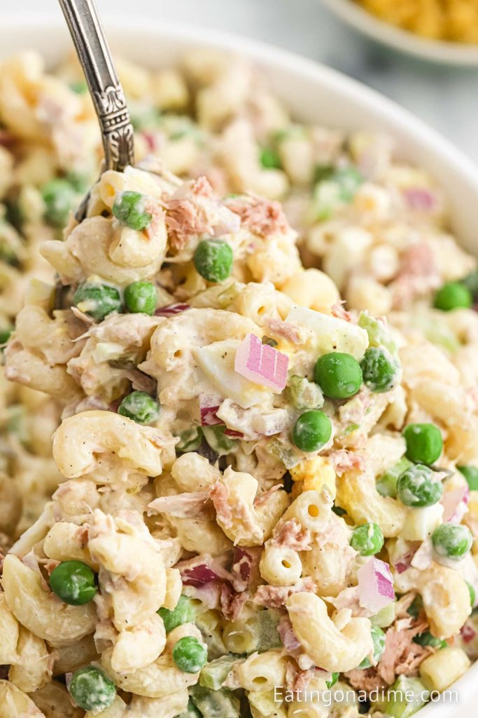 Bowl of Tuna Macaroni Salad with a serving on the spoon