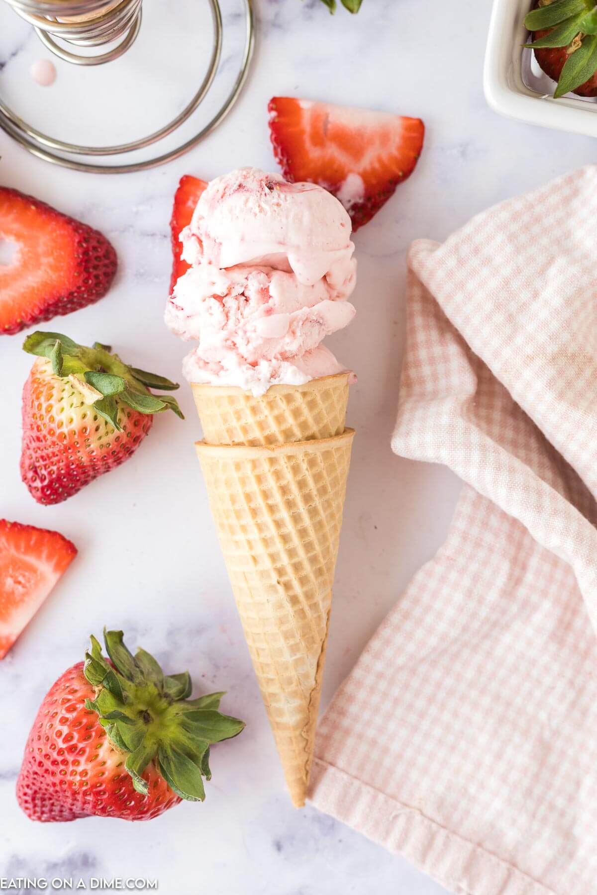 Scoops of Strawberry Ice Cream on a cone