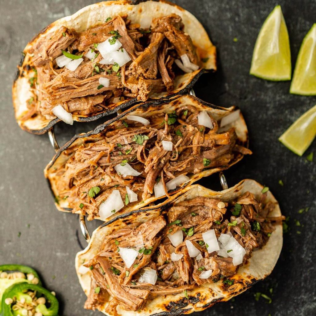 Beef Carnitas tacos in a taco stand