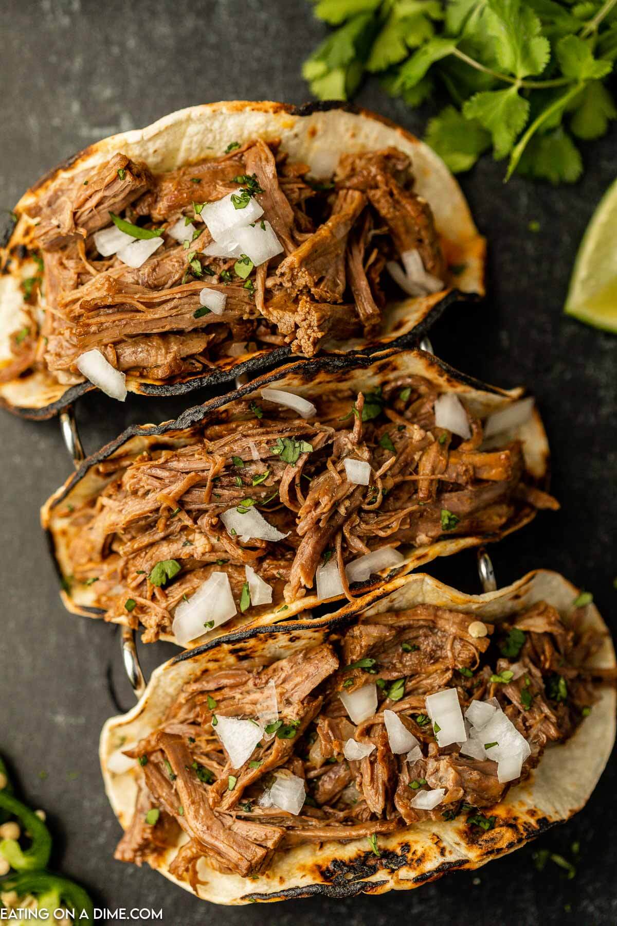 Beef Carnitas tacos in a taco stand