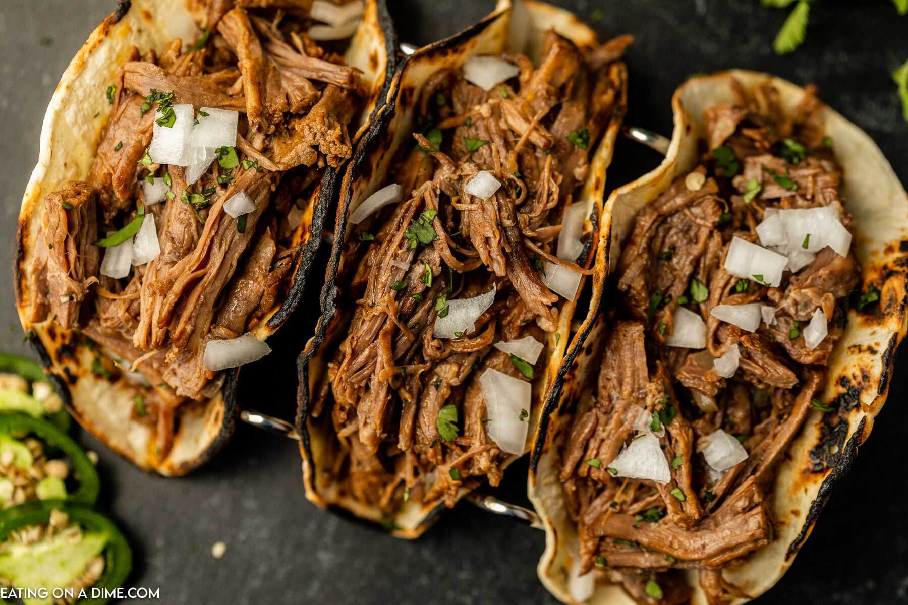 Beef Carnitas tacos in a taco stand