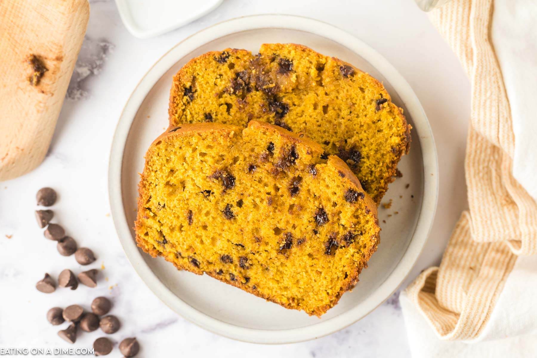 Pumpkin Chocolate Chip Bread sliced on a plate
