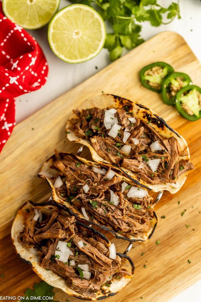 Beef carnitas tacos in a taco stand