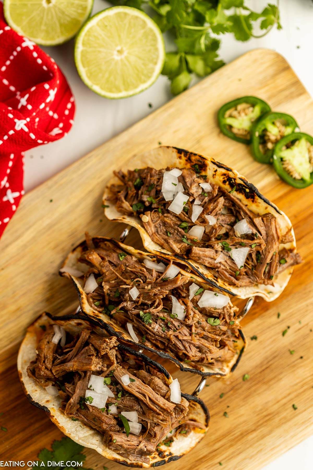 Try Slow Cooker Beef Carnitas Recipe for a meal sure to impress. There are tons of options for this easy beef carnitas recipe from tacos. salads and more. Beef carnitas tacos in a taco stand