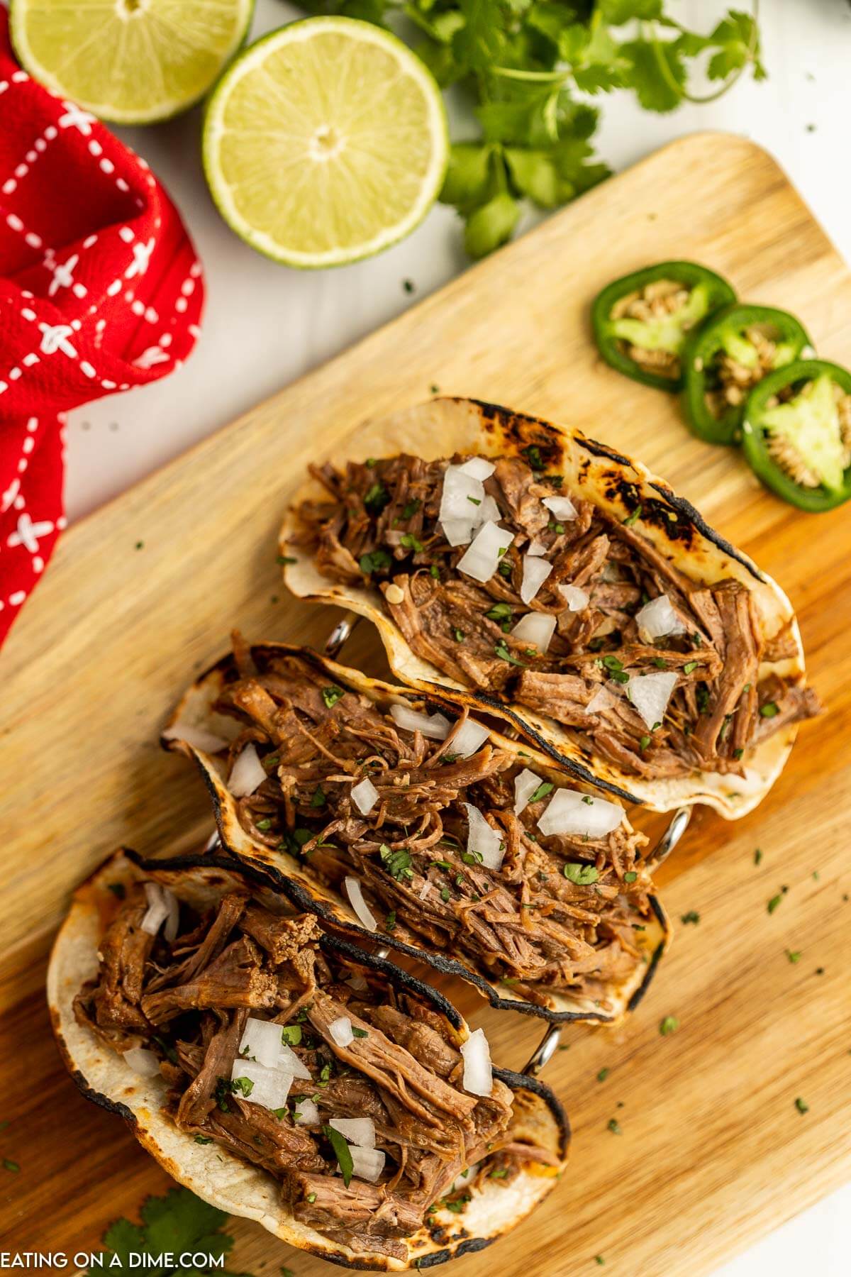 Beef carnitas tacos in a taco stand