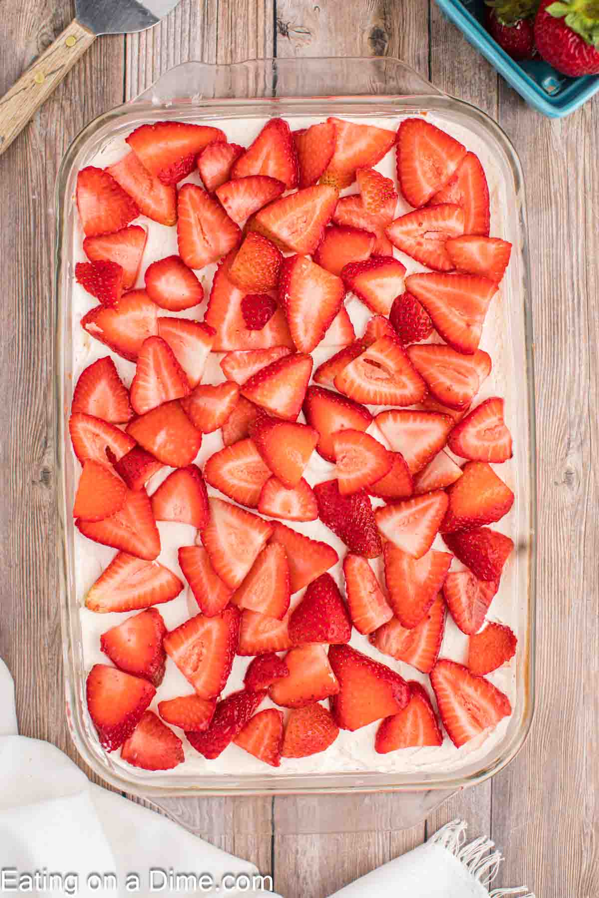 Topping with slice strawberries