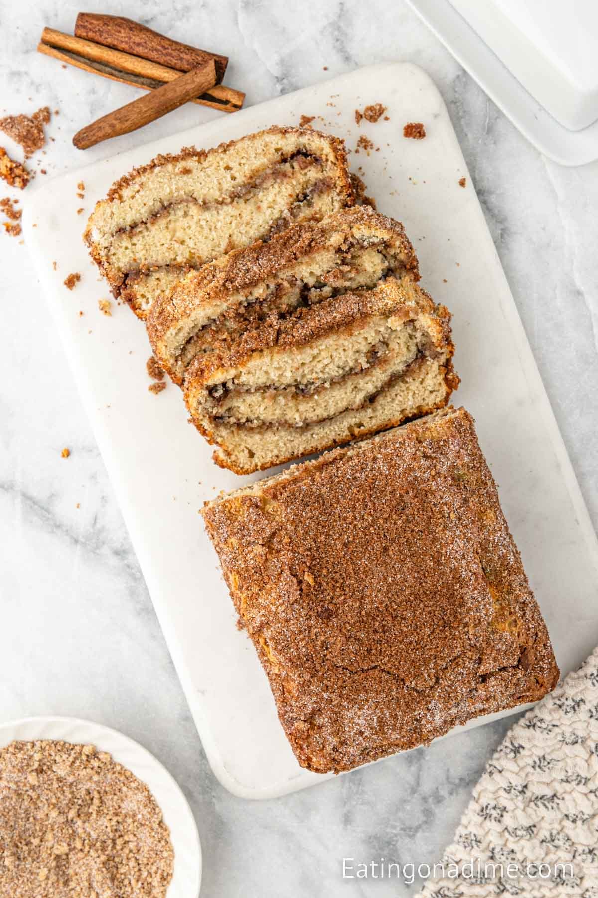 Slice snickerdoodle bread on a cutting board