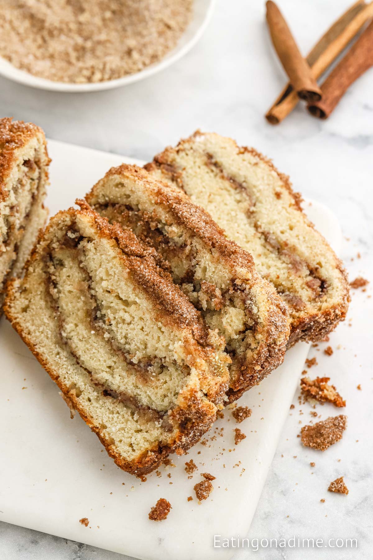 Slice snickerdoodle bread on a cutting board