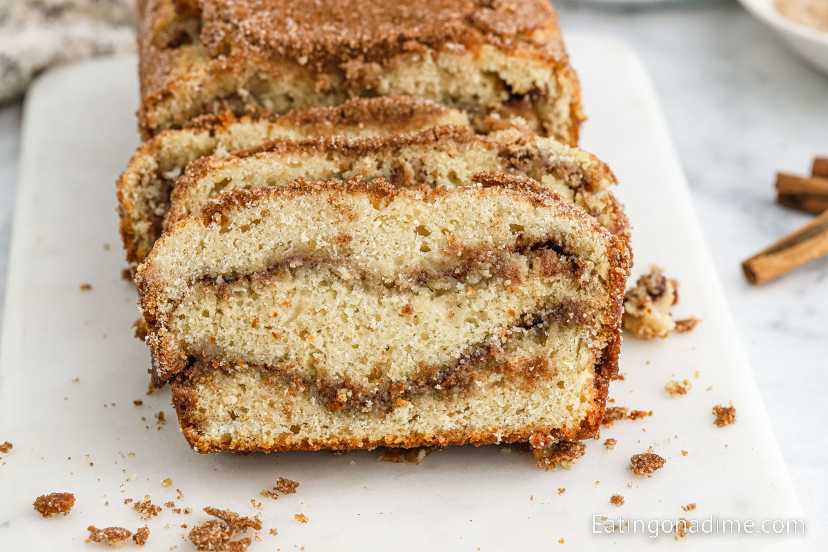 Slice snickerdoodle bread on a cutting board