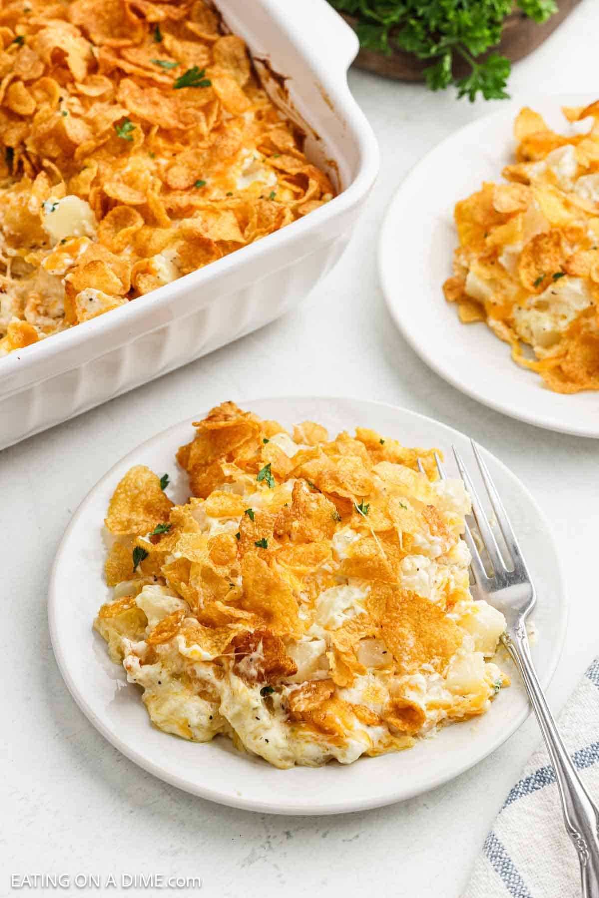 A serving of the corn flake and creamy hashbrown mixture on a plate.